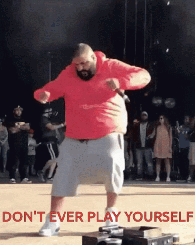 Dj Khaled standing in celebration