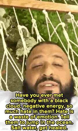 Dj Khaled standing focused